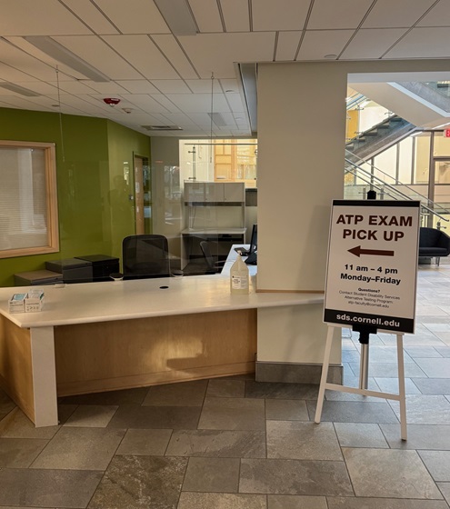 Exam pick-up desk is on level 4 of Cornell Health. Enter from Ho Plaza. It will be towards your left by the pharmacy entrance in the lobby..